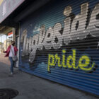 A woman chats on her phone, wearing a mask,while walking down Ocean Avenue in early January.She strolls pass a mural highlighting, “Ingleside Pride,” painted on a closed medical business. Residents in the neighborhoods of Ingleside, Excelsior, Mission and the Tenderloin are struggling to continue paying rent.Despite the region’s high rents, the percentage of San Francisco area residents who are behind on their rent is lower than the national average.