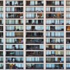 A view of dozens of apartment balconies that form a grid at Flox Plaza Apartments in San Francisco.