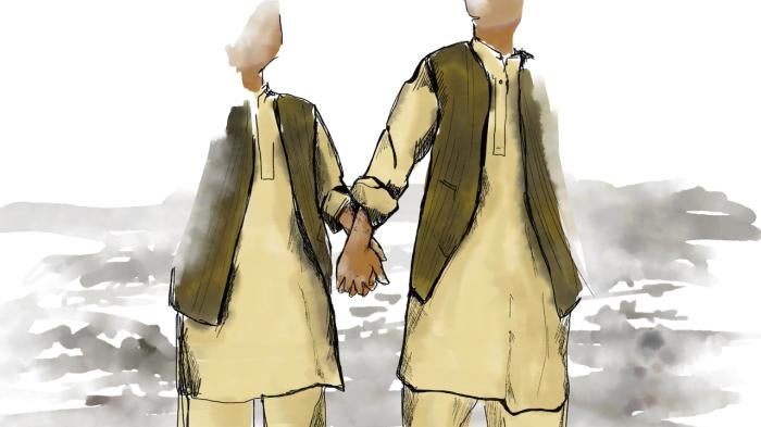 Two men hold hands