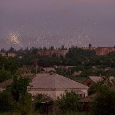 Rocket-delivered incendiary elements descend during an attack on the town of Marinka, in Donetska region, Ukraine, June 3, 2022. 