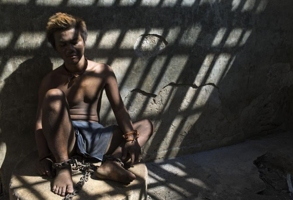 This man with a real or perceived psychosocial disability is one of the residents at Marsiyo’s House, a private family-run social care facility in Kebumen, Central Java, Indonesia. The crumbling shelter where he is chained leaves him exposed to hours of direct sunlight and constant dust.