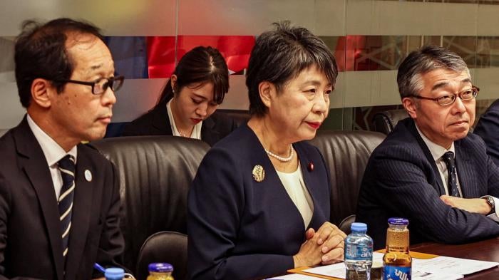 Japan's Foreign Minister Yoko Kamikawa (C) and her delegation met with both the Israeli Foreign Minister in Tel Aviv and later the Palestinian Foreign Minister in the occupied West Bank on November 3, 2023. 