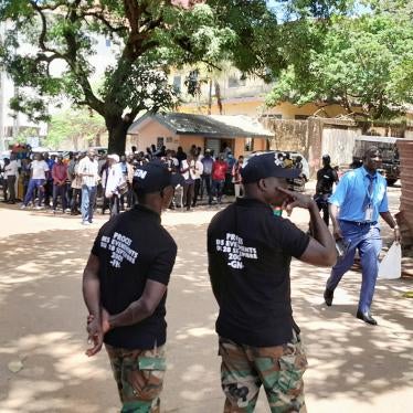 Security force members stand in a street ahead of the trial of eleven men accused of responsibility for the 2009 massacre and mass rape of pro-democracy protesters by forces linked to a former military junta in Conakry, Guinea, September 28, 2022.