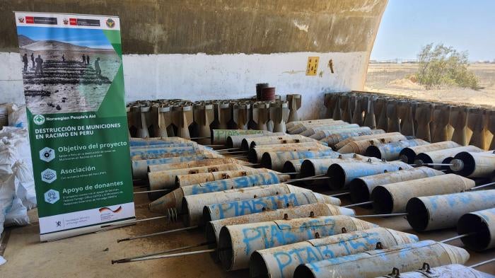 Stockpiled cluster munitions and their submunitions being prepared for destruction.