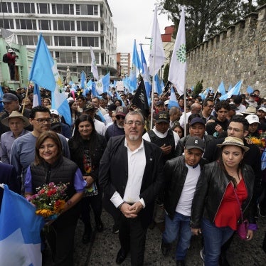 Bernardo Arévalo, Guatemala's incoming president, center, leads demonstrators during a protest at the Supreme Court of Justice in Guatemala City, Guatemala, December 7, 2023.