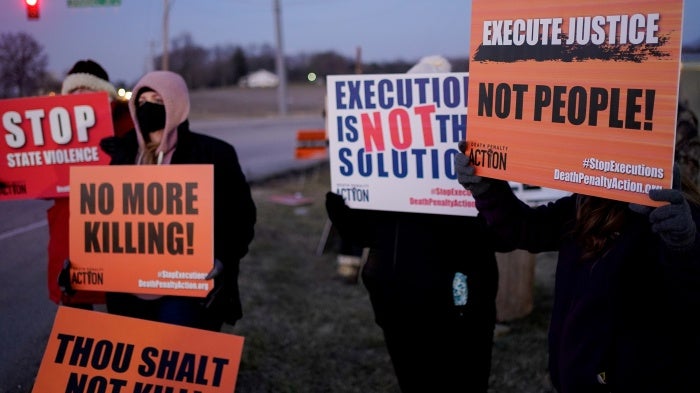 Activists calling for an end to the death penalty gather to protest an execution at the United States Penitentiary in Terre Haute, Indiana, January 12, 2021.