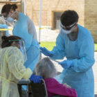 U.S. Army Spc. Sterling Hutcheson, a medic with the Colorado National Guard Joint Task Force Test Support, prepares to swab a nursing home resident during COVID-19 testing in Rocky Ford, Colo. on May 29, 2020.