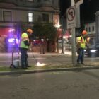 San Francisco city workers use blowtorches to remove grass and weeds from a median on Broadway at Polk Street on Feb. 3, 2020. City workers rely much less on herbicides than they did just five years ago, as health concerns mount.