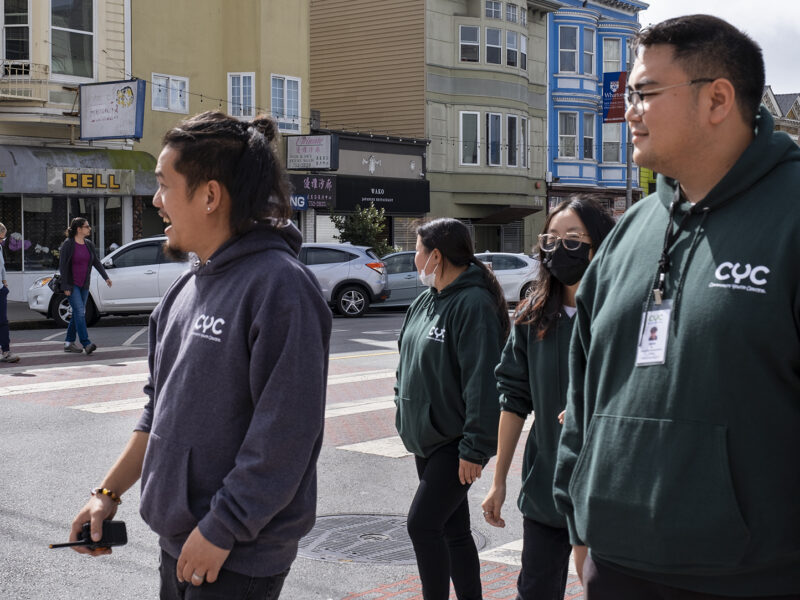 Henry Ha and other outreach team members visit the Richmond District in San Francisco.