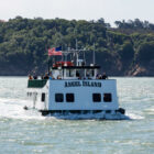 A ferry travels on the water.