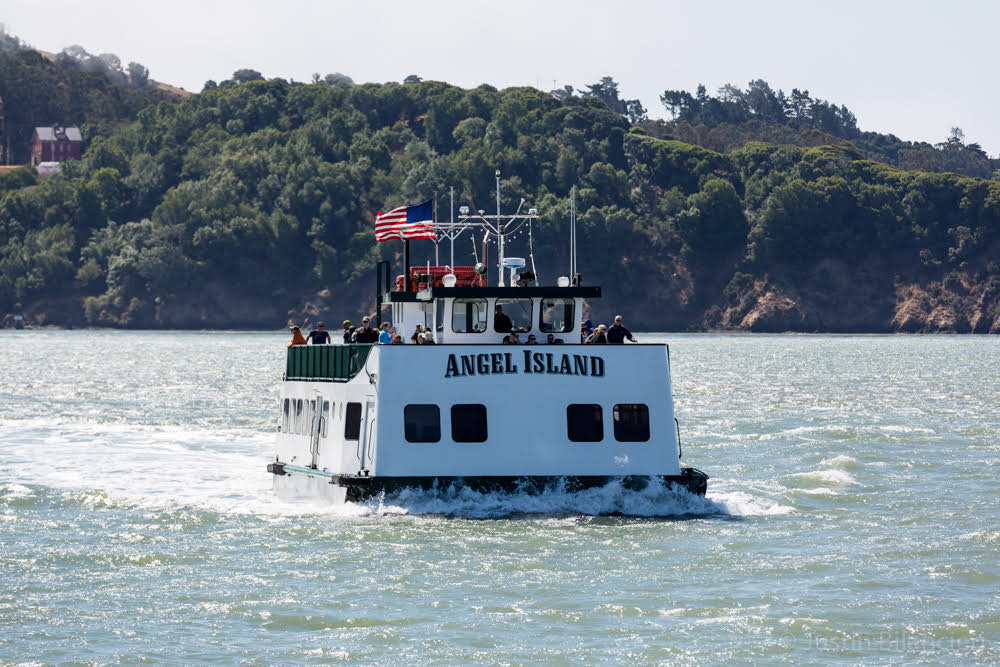 A ferry travels on the water.