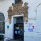 Signs at a side entrance to Mission High School outline coronavirus safety guidelines for students.