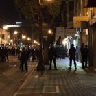 Police form a line around a small group of protesters and one journalist held on the scene in what officers called a “mass arrest” on June 3, 2020.