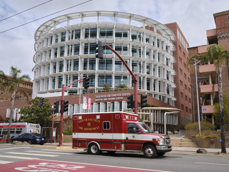 An ambulance passes in front of the Zuckerberg San Francisco General Hospital and Trauma Center.